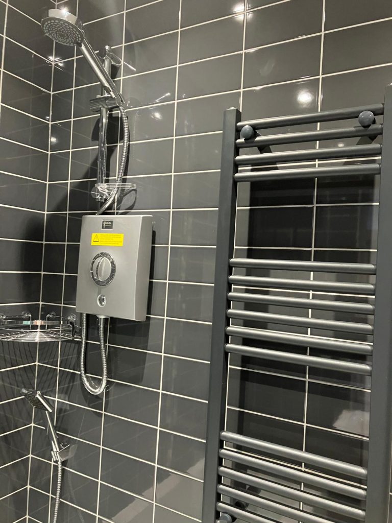 Bathroom with Aqualisa electric shower in Northampton