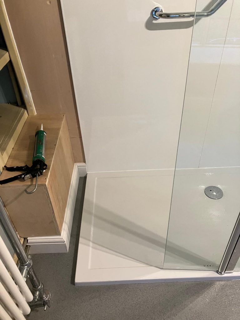 Low level access shower conversion in a Northampton period